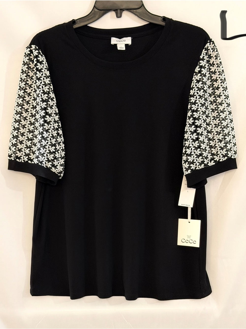 CeCe Black Tee with White Patterned Puff Sleeves